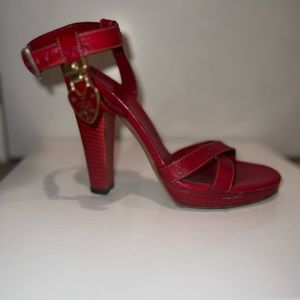 Gucci red sandal heels with heart lock